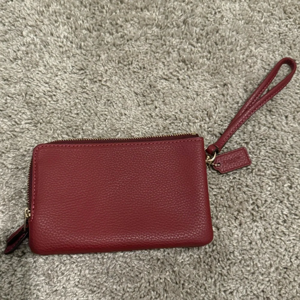 Like 🆕 Coach saturated magenta mini wristlet wallet pouch